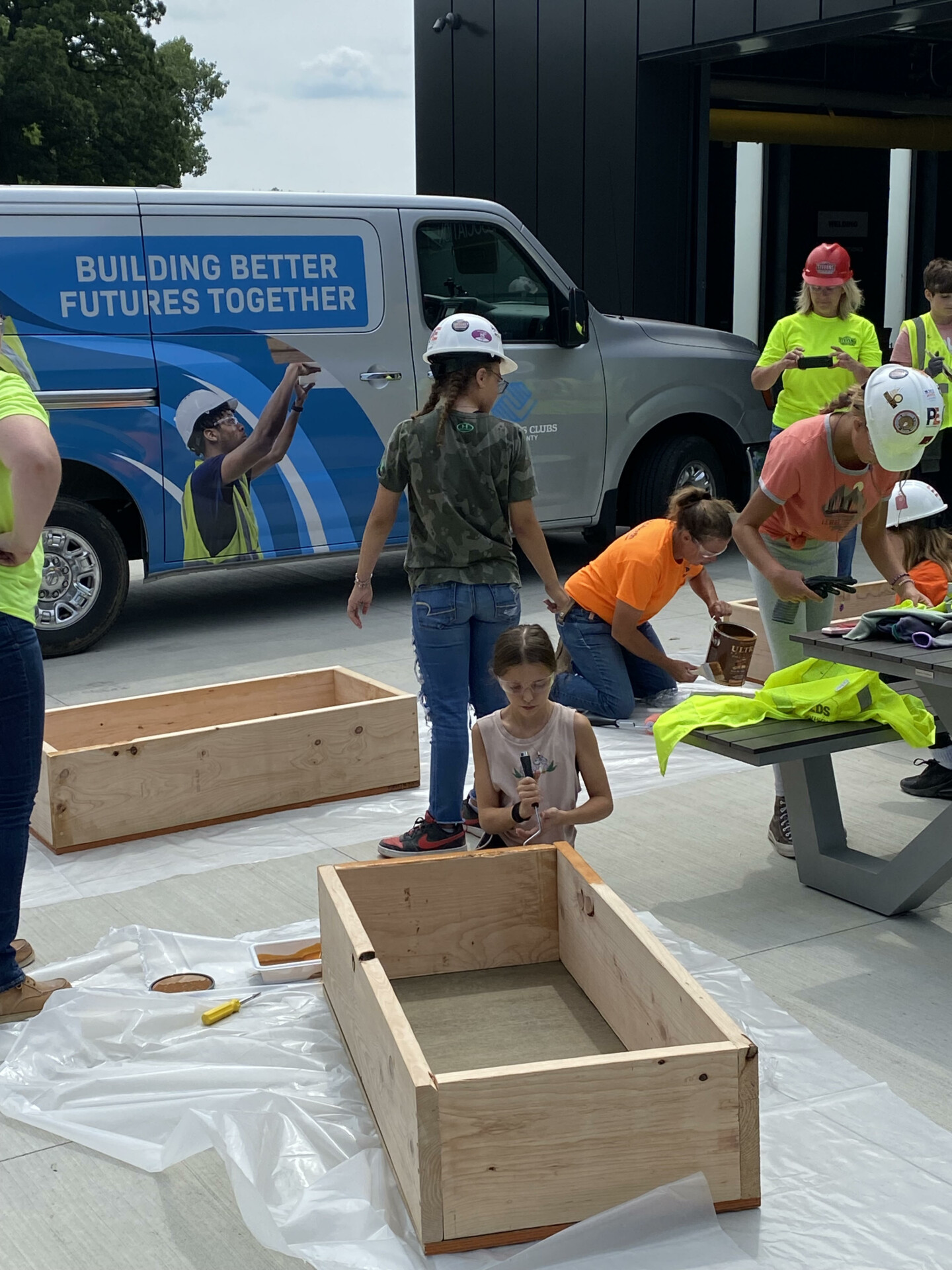 Kids working on construction projects as part of programming through Boys & Girls Club of Dane County, Wisconsin
